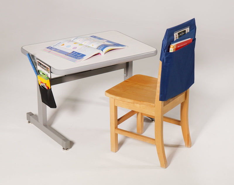 Black Hand-e-Sack hanging from side of desk with school supplies