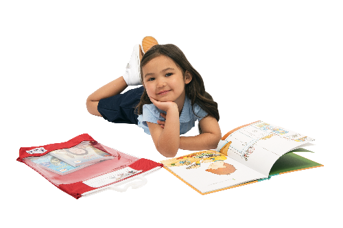 Little girl reading a book with a red Read-n-Go book baggie