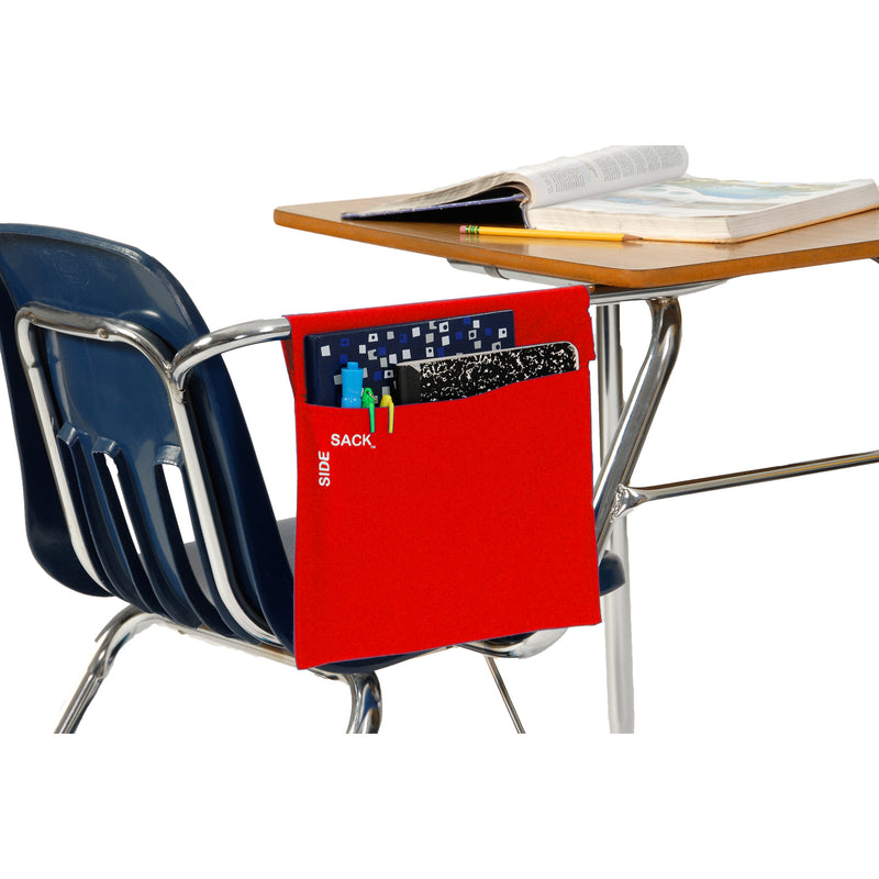 Red Side Sack hanging on a side arm desk with notebook and school supplies