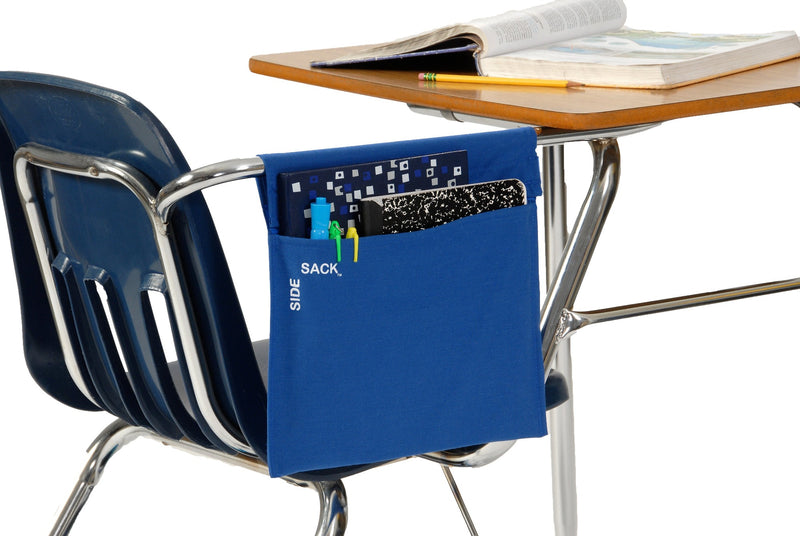 blue side sack hanging on a tablet arm desk with a binder, memo book and school supplies